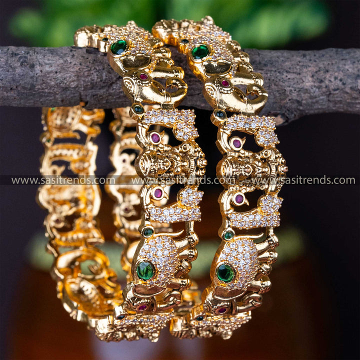 Exquisite Temple Wear Matte Gold Plated Lakshmi Designer Bangles with AD Stones