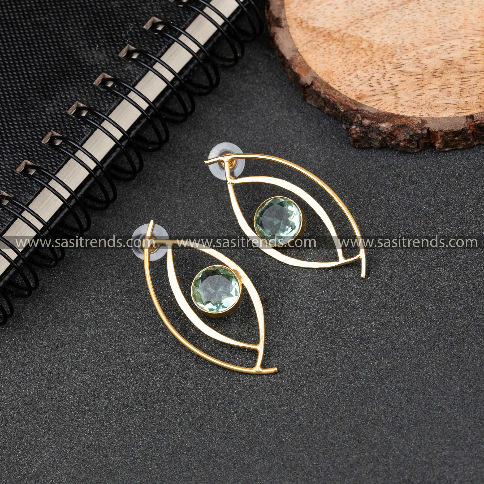 Gold Plated Aqua Blue Monalisa Stone Studded Push Back Eye Pattern Earrings