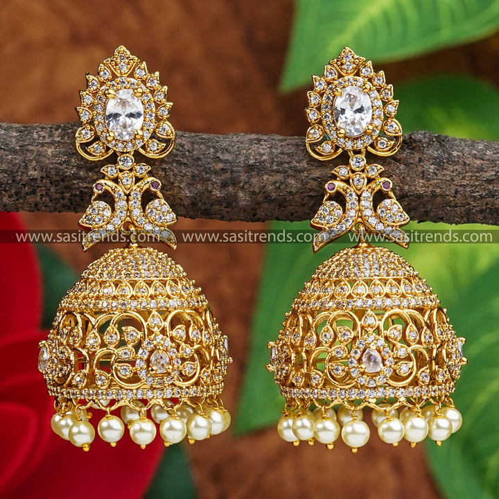 Elegant Peacock Motif Bridal Jhumka Earrings | Temple Matte Gold Plated | American Diamond Stones