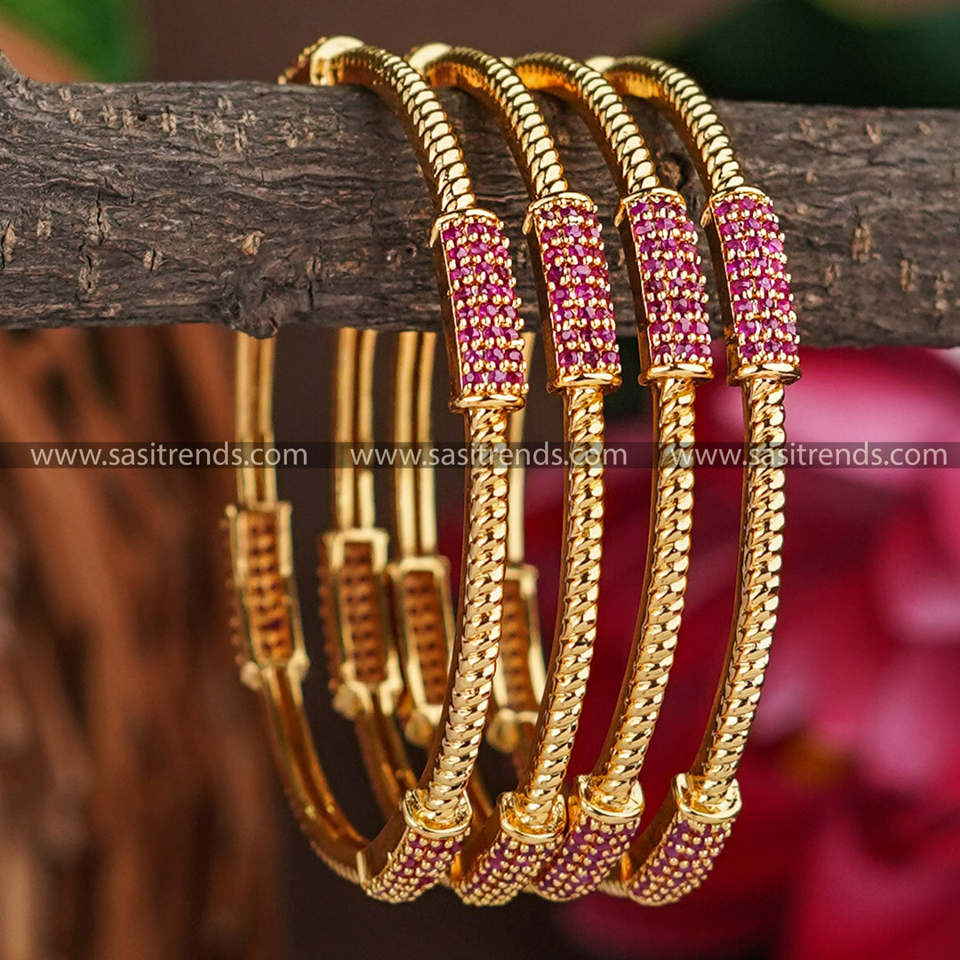 Exquisite ruby-studded traditional bangle set with 24 carat micro gold plating.