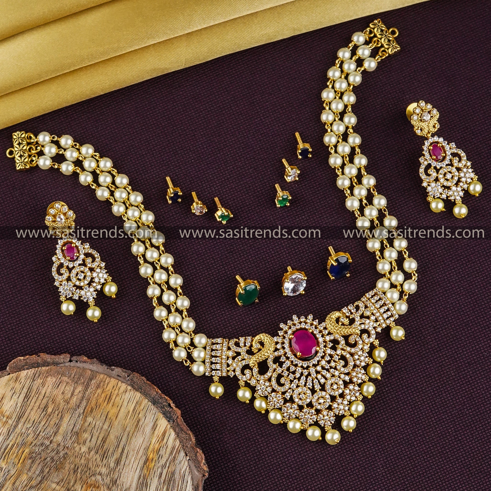 Temple Gold Plated 3-layer pearl peacock choker set with American diamond stones, perfect for Indian traditional occasions.