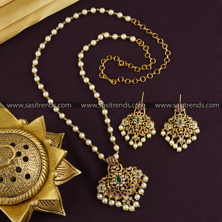 Charming Temple Matte Gold Finish Pearl Mala Floral Pendant Jewellery Set with Multi-Color AD Stones | Sasitrends