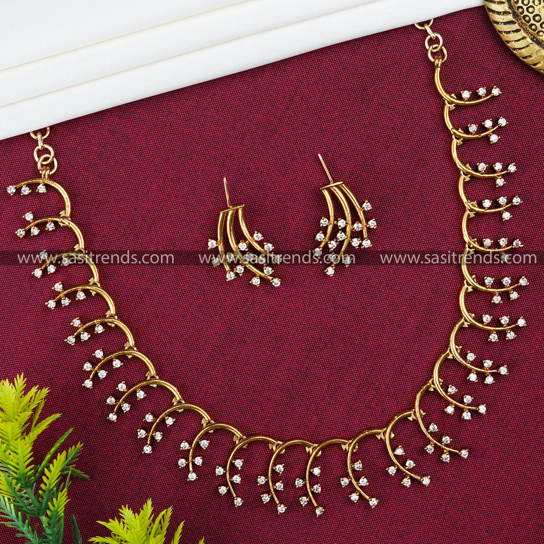 Matte Gold Plated Leaf Motif American Diamond Necklace and Earring Set - Perfect for Parties