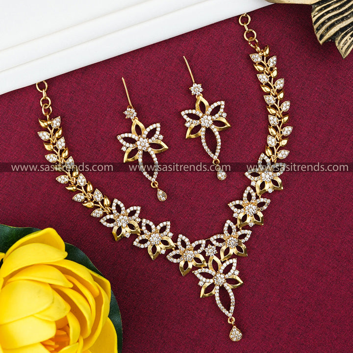 Charming Party Wear Temple Matte Gold Plated Floral Pendant Jewellery Set with AD Stones | Sasitrends