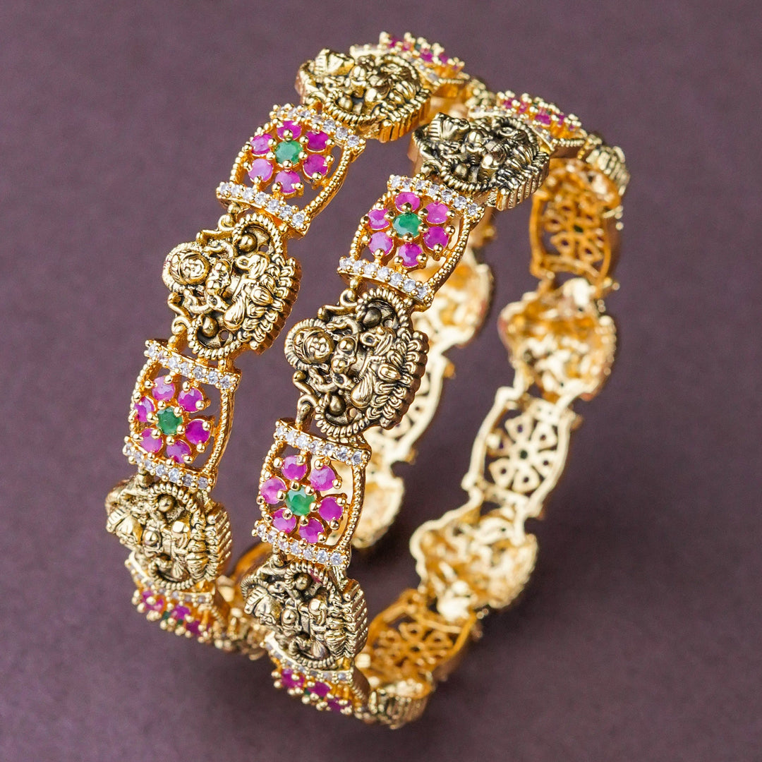 Elegant Bridal Accessory: Lakshmi bangle, lotus, floral pattern, American diamond studded, brass material, black matte gold plating