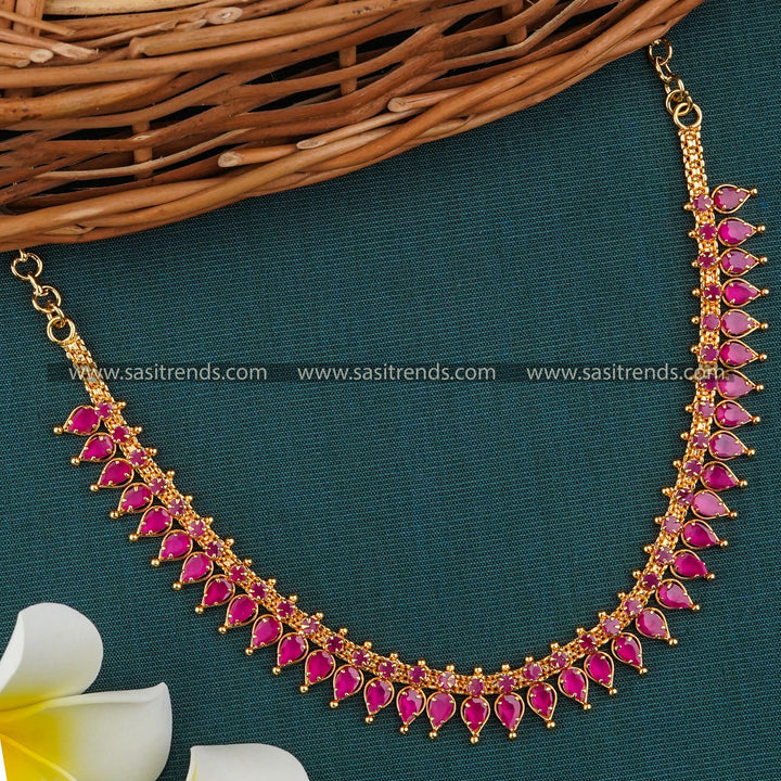 Elegant Micro Gold-Plated Necklace with Tilak Design Stones and American Diamond Embellishments