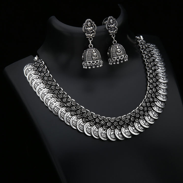 Ethereal Lakshmi Coin Jewellery Set in Oxidised Silver and Antique Gold with Jhumka Earrings