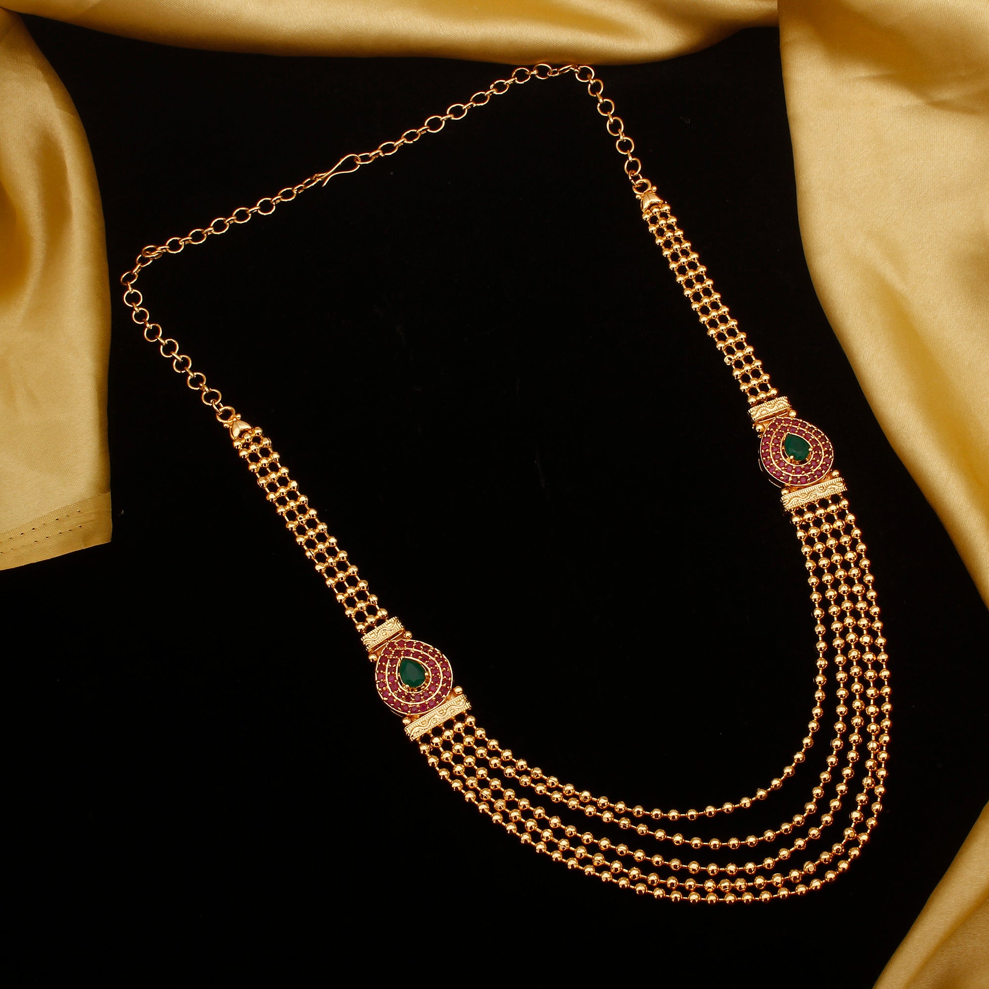 Micro Gold-Plated Necklace with Mugappu Motif and Jhumkas - Brass Material, AD Stones, Five-Layered Golden Bead Chain