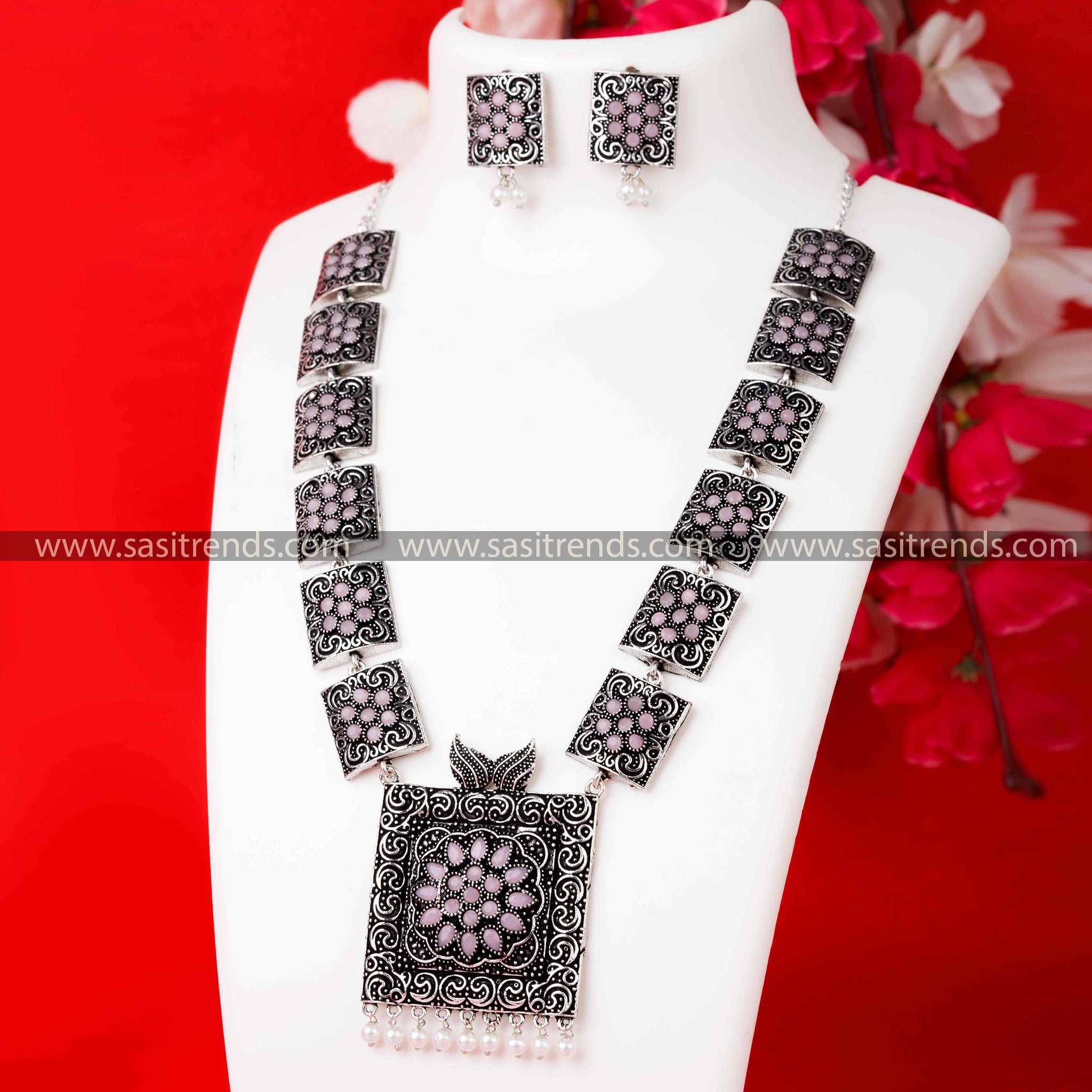 Trendy Party Wear Oxidised German Silver Pearl Necklace with Pink Stone Pendant and Matching Pearl Earrings.