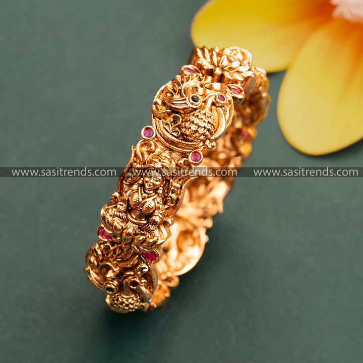 Temple Matte Gold Grand Bridal Lakshmi and Peacock Motifs Kada Bangle - Temple Gold Tone with Ruby-Green American Diamond Stones