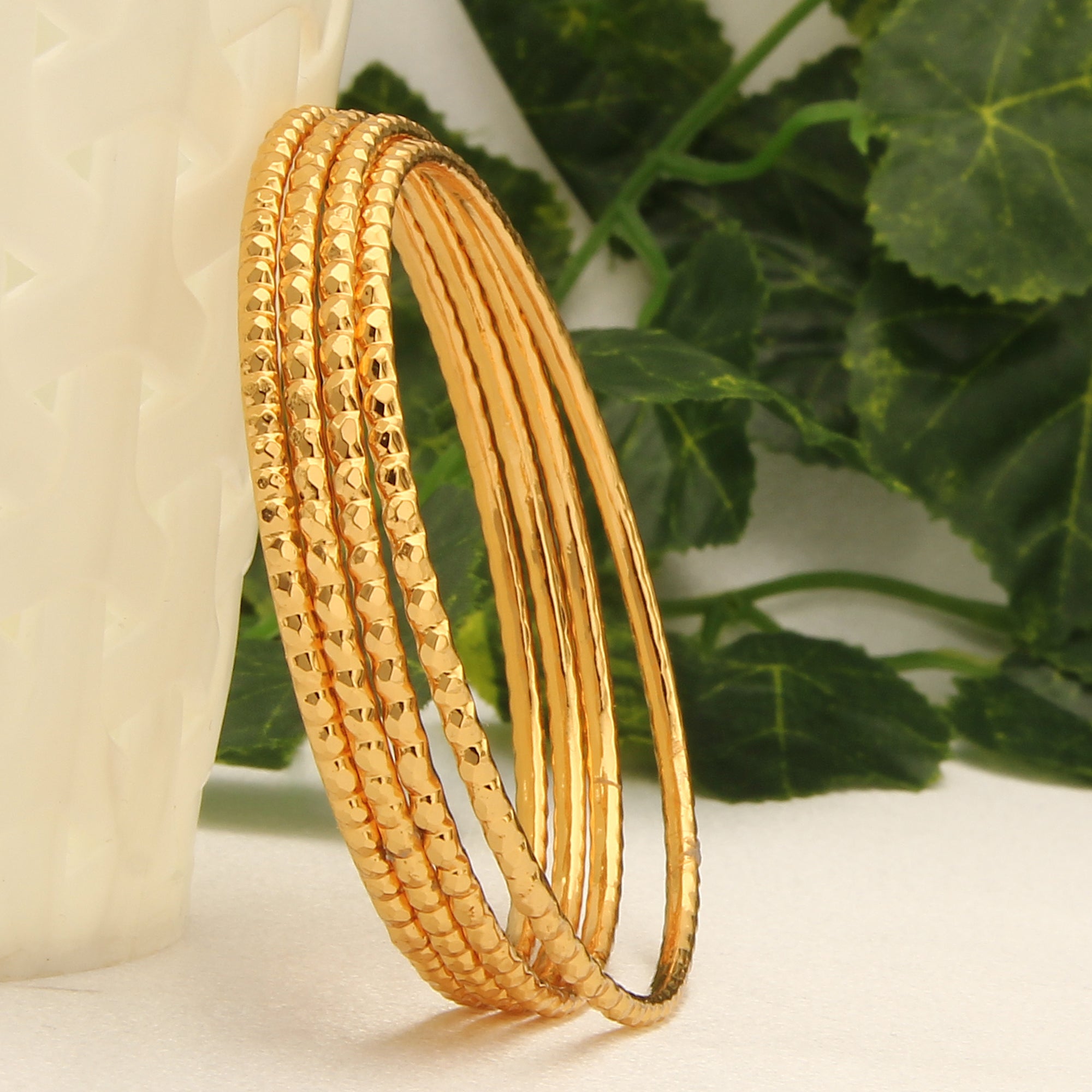 Slim gold shop bangles design