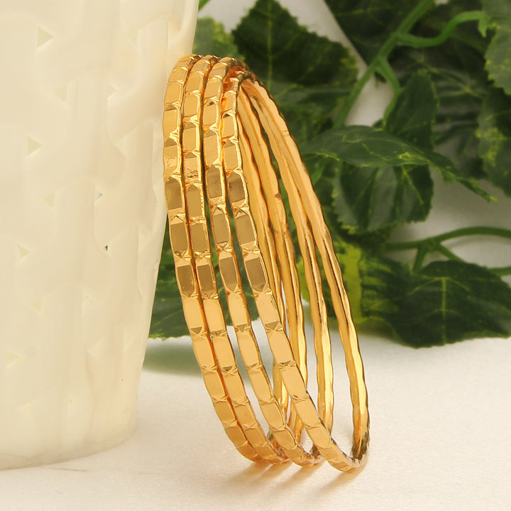 Set of 4 Micro Gold Finished Thin Bangles - Festive Chic for Online Shopping