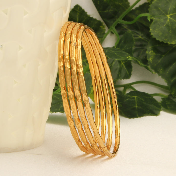 Shop Festive Collections: Micro Gold Finished Thin Bangles Set of 4 - Trendy Jewelry for Online Shopping