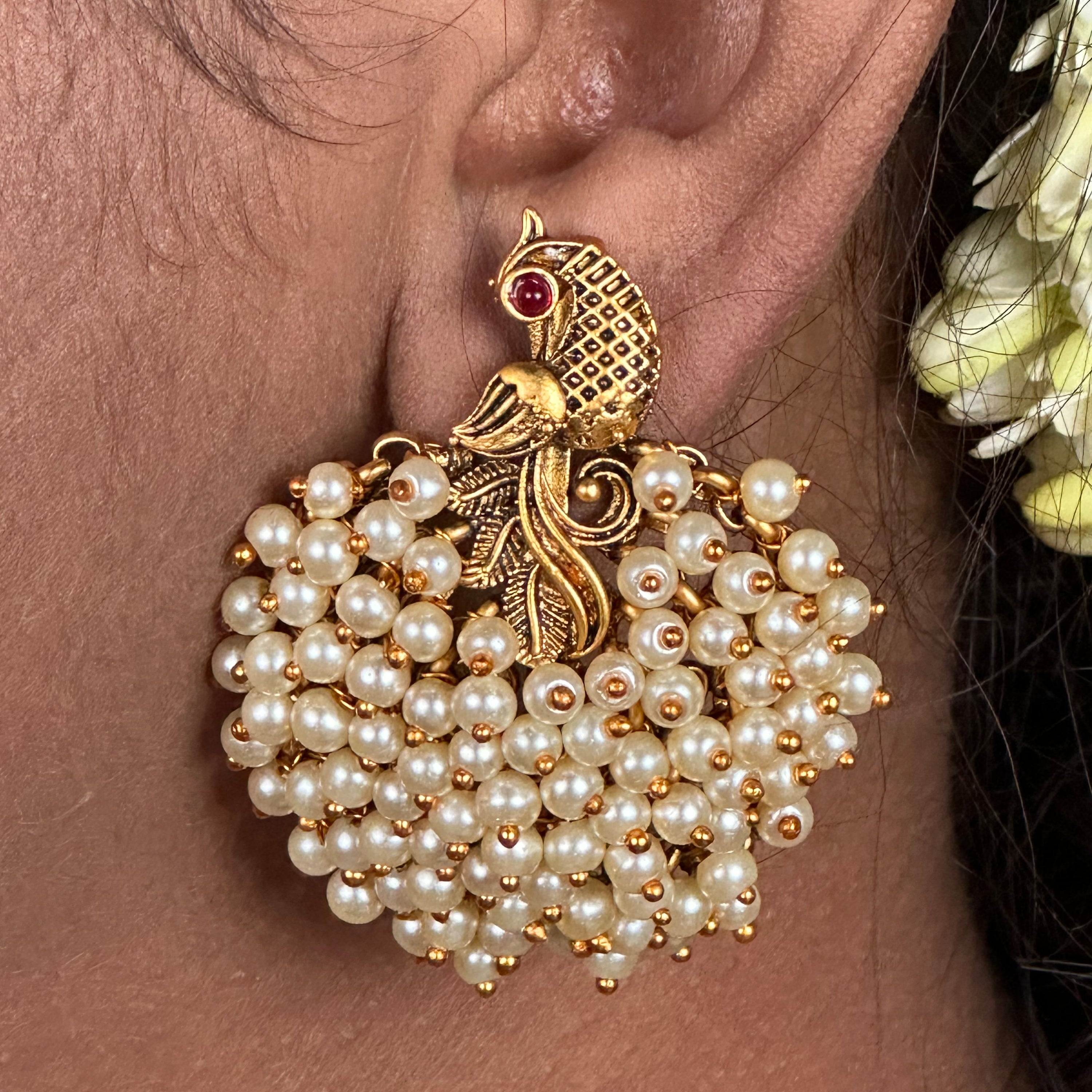 Pearl Bunch Peacock Earrings - Lustrous pearls arranged in a captivating peacock-inspired design