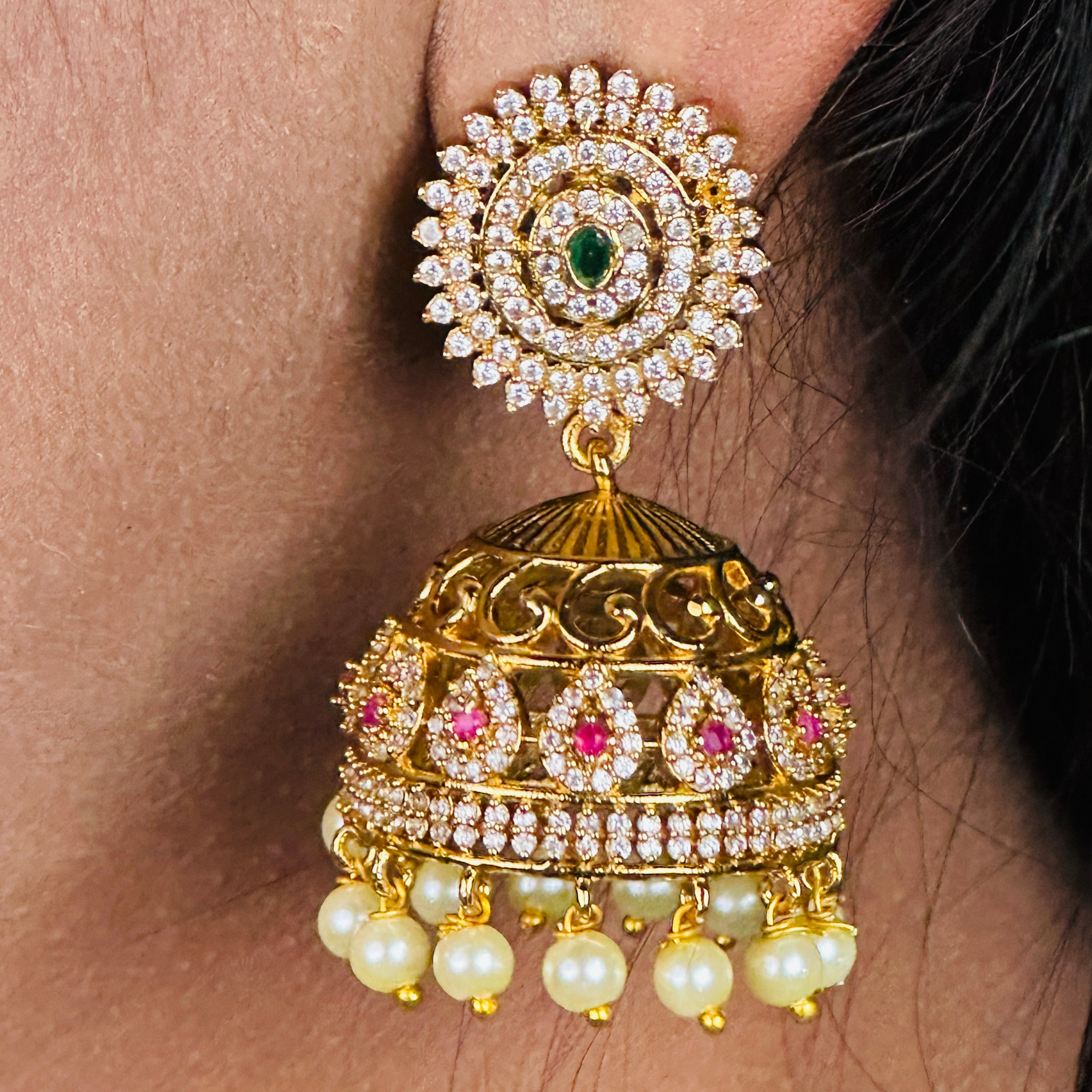 Brass Jhumka Earrings with Exquisite Hangings: Glamorous AD Stone Accents