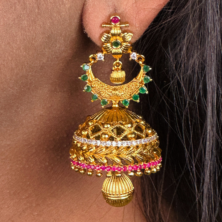 Ethereal Temple Matte Gold Plated Glow Half Moon Jhumkas Earrings Adorned with Sparkling AD Stones | Sasitrends