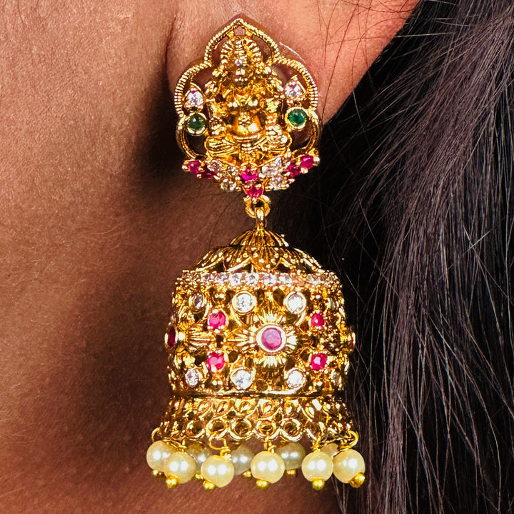 Lakshmi Temple Matte Gold Plated Jhumka Earrings Exquisite Beauty and Divine Grace | Sasitrends