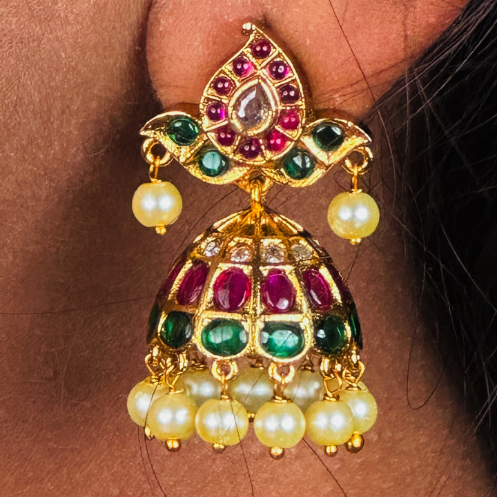 Exquisite Temple Matte Gold Plated AD Kemp Stone Jhumka Earrings | Sasitrends