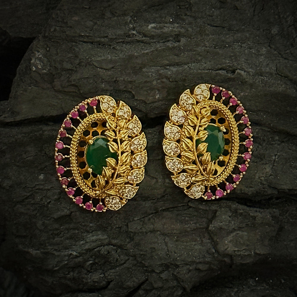 Nature-inspired oval leaf AD stud earrings with sparkling stones, a captivating blend of elegance and glamour