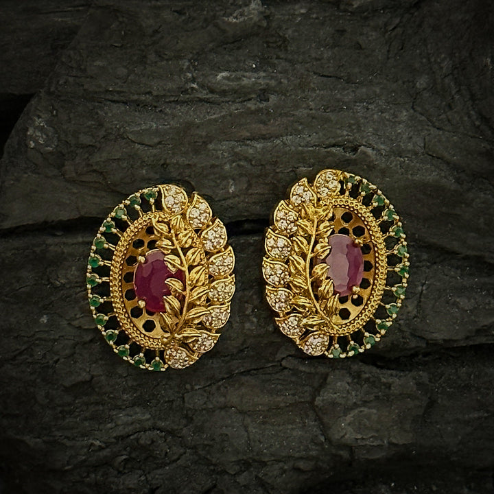 Radiant Leaf Reflection Temple Matte Gold Plated AD Oval Shaped Stud Earrings | Sasitrends