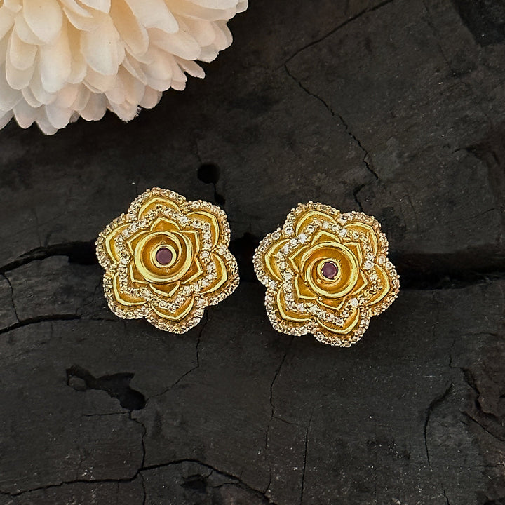 Captivating AD Stone Rose Flower Design Temple Matte Gold Finished Stud Earrings