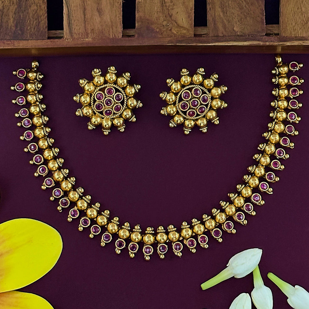 Matte Gold Tone Bridal Necklace Set with American Diamond Stones and Jhumkas