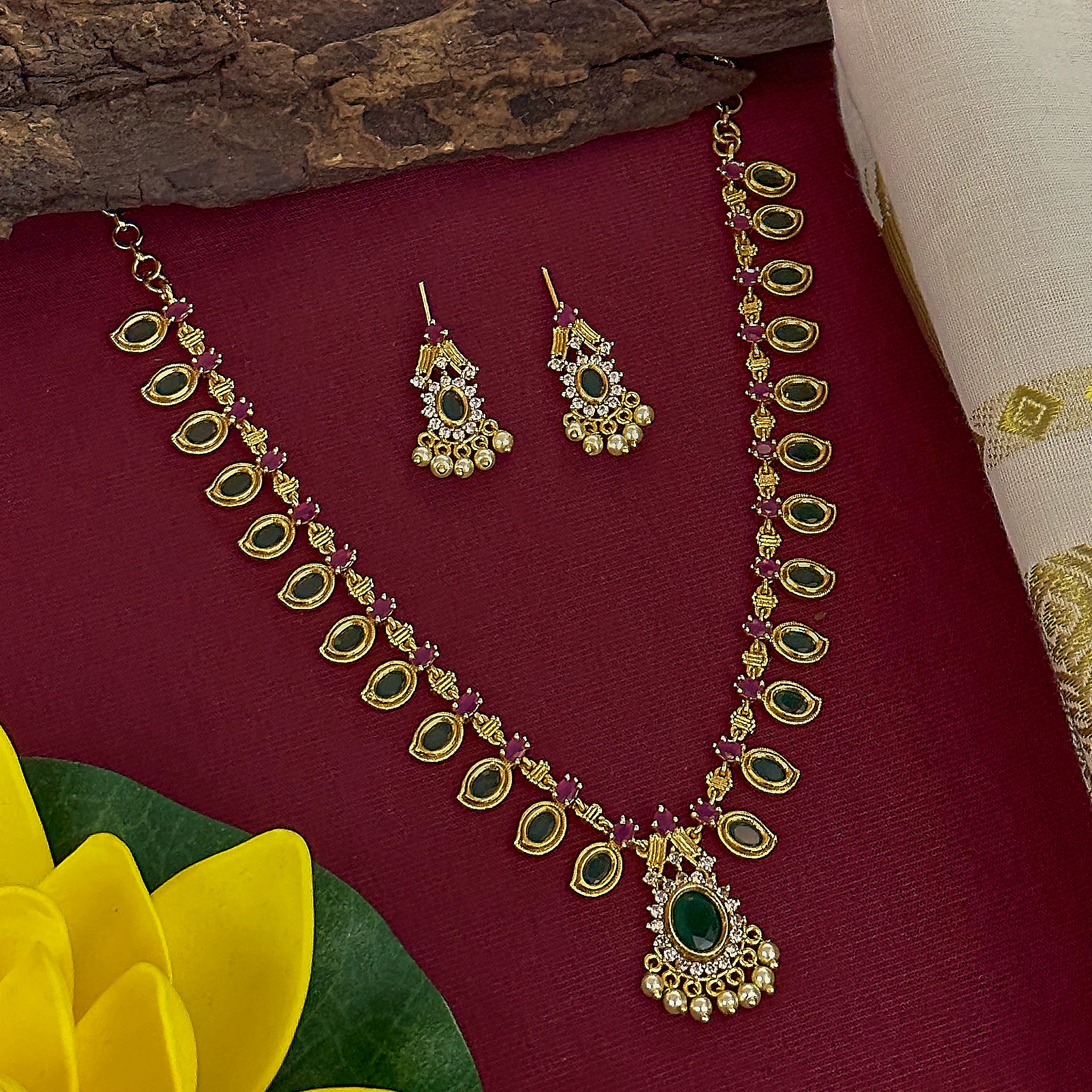 Trendy temple gold finish palakka mala necklace with earrings