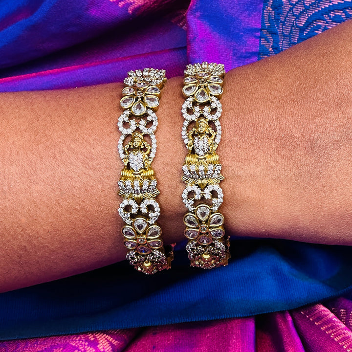 Lakshmi Floral Matte Black Gold Bangle - Exquisite bridal accessory, intricate floral motifs, opulent ad stone embellishments.