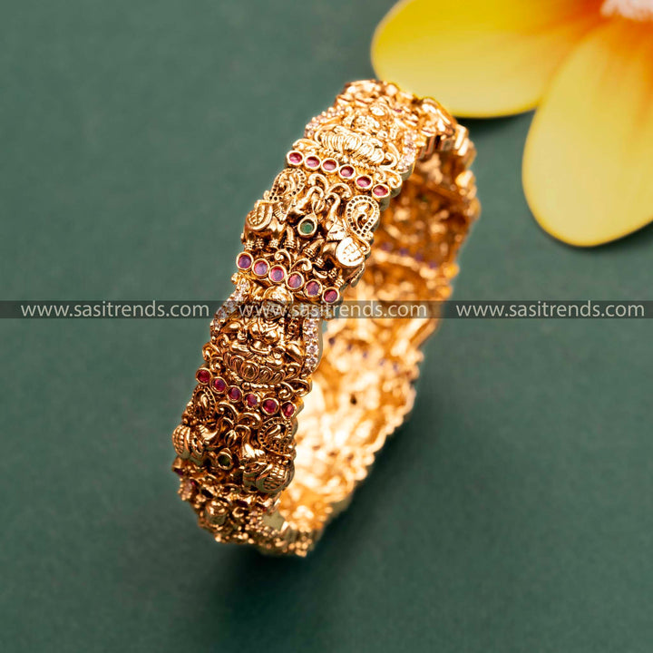 Matte Gold Lakshmi and Elephant Motif Kada Bangle with Multi Synthetic Stones - Traditional Jewelry for Online Shopping