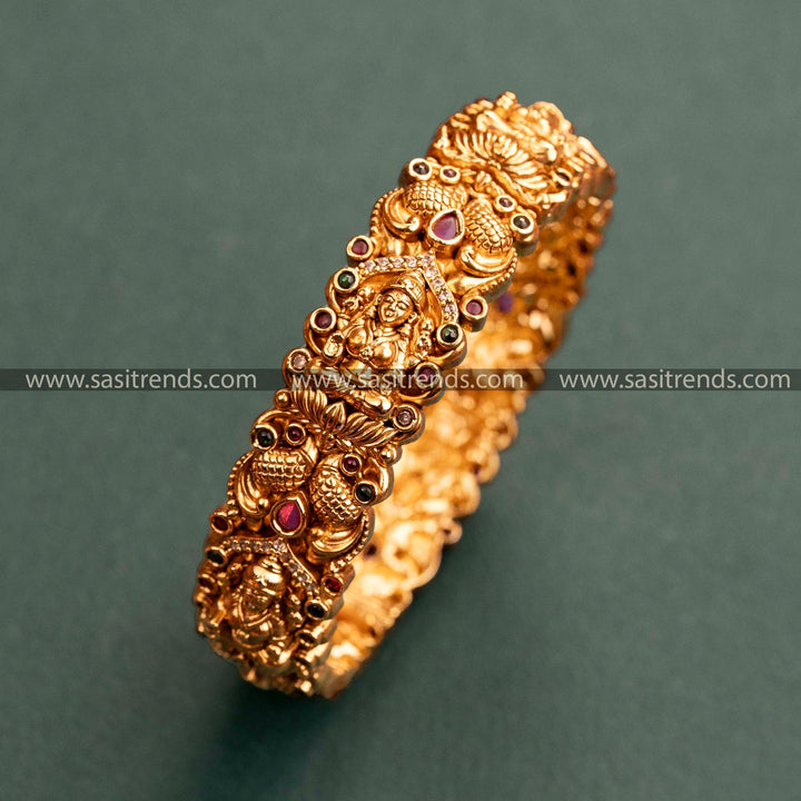 Graceful Traditional Lakshmi & Peacock Motif Temple Matte Gold Finish Openable Kada Bangle with Ruby-Green Stones