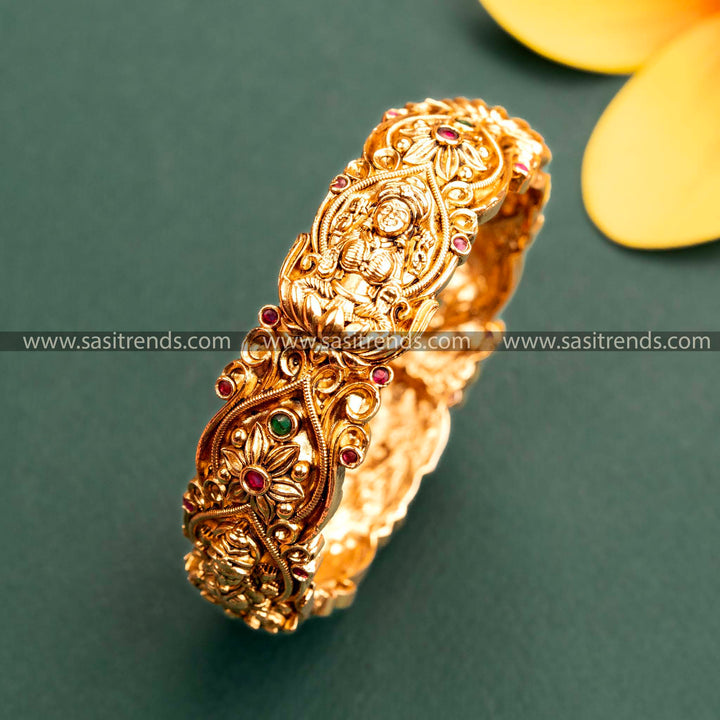 Latest Temple Matte Gold Plated Lakshmi Kada Bangle with Ruby-Green American Diamond Stones for Women | Sasitrends