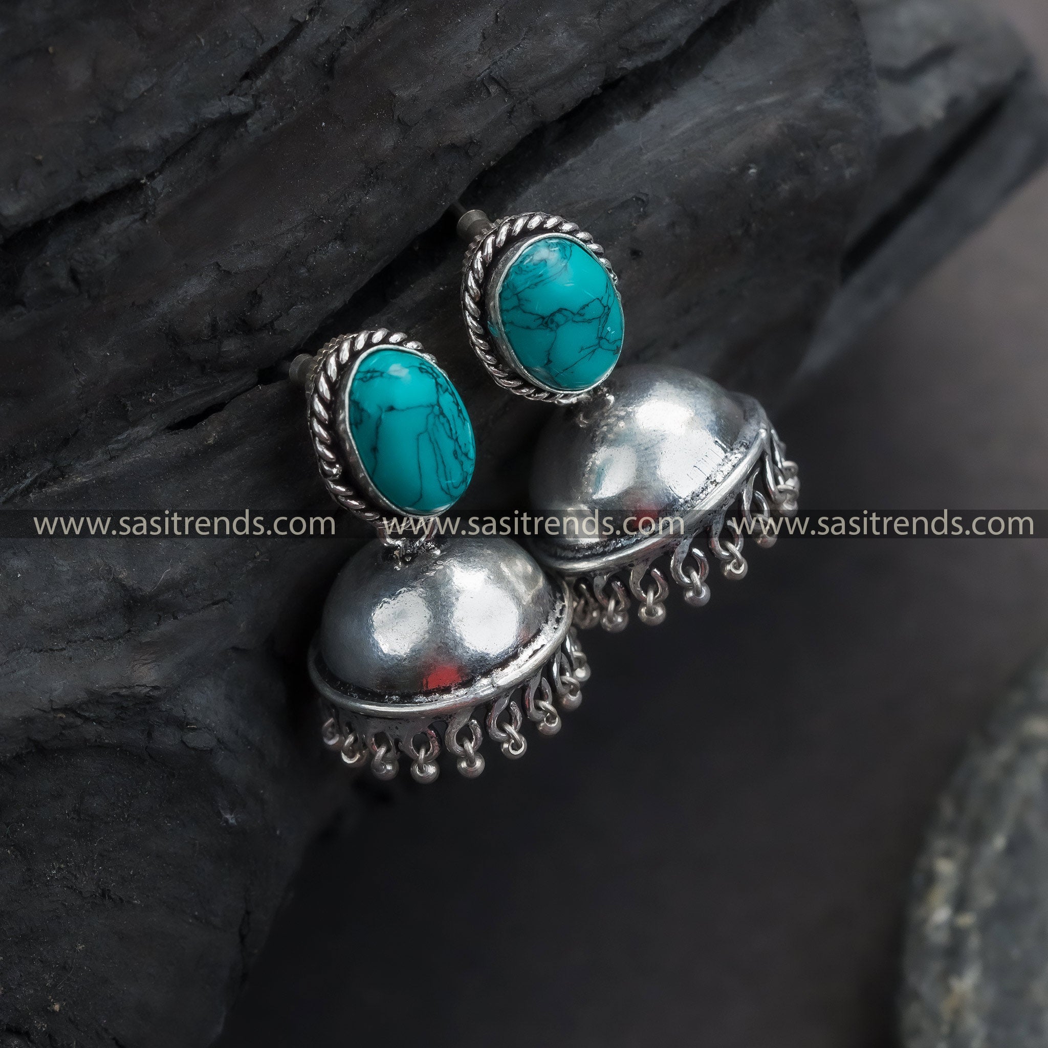 Trendy traditional oxidized German silver jhumkas with Monalisa stones in elegant black, perfect for women's fashion statements.