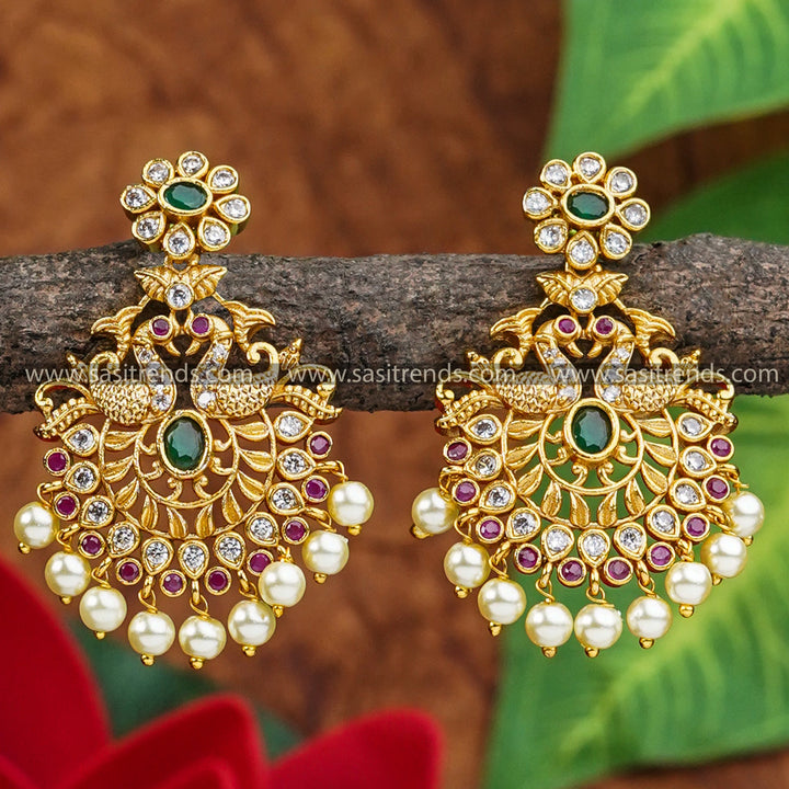 Gorgeous Temple Matte Gold Plated Earrings with American Diamond Stones