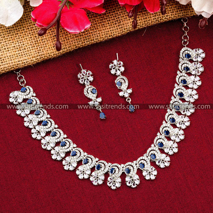 Captivating Blue Stone Floral Pattern Necklace Set - Rhodium Plated, American Diamonds, Party Wear Jewelry