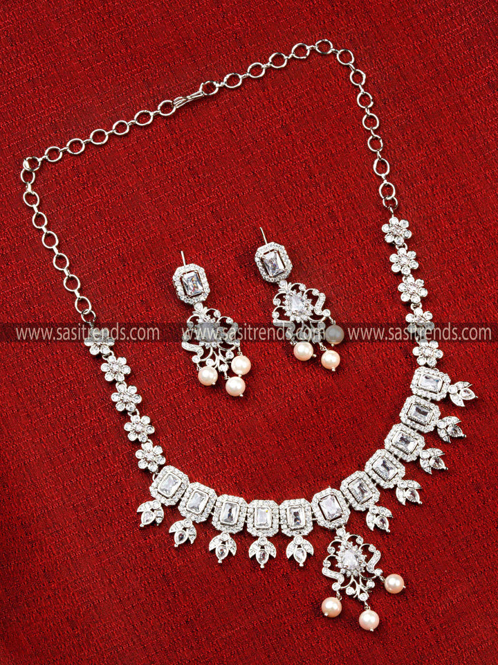 Trendy Rhodium Silver Floral Party Necklace Set with American Diamonds and Earrings