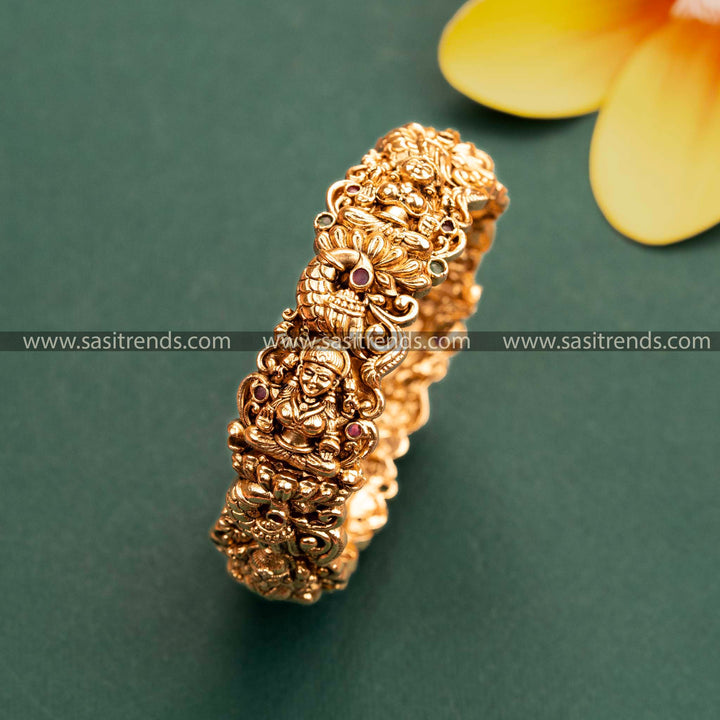 Matte Gold Lakshmi Peacock Kada Bangle with Ruby-Green Stones for Women