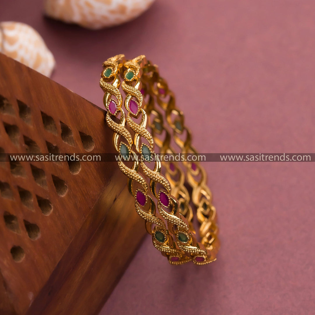 Matt gold plated bangles with leaf American diamond stones for women