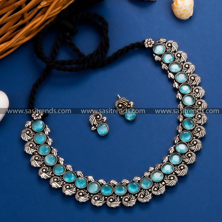 Gorgeous Sky-Blue Stone Peacock Kushi Oxidized German Silver Necklace Set for Party Wear