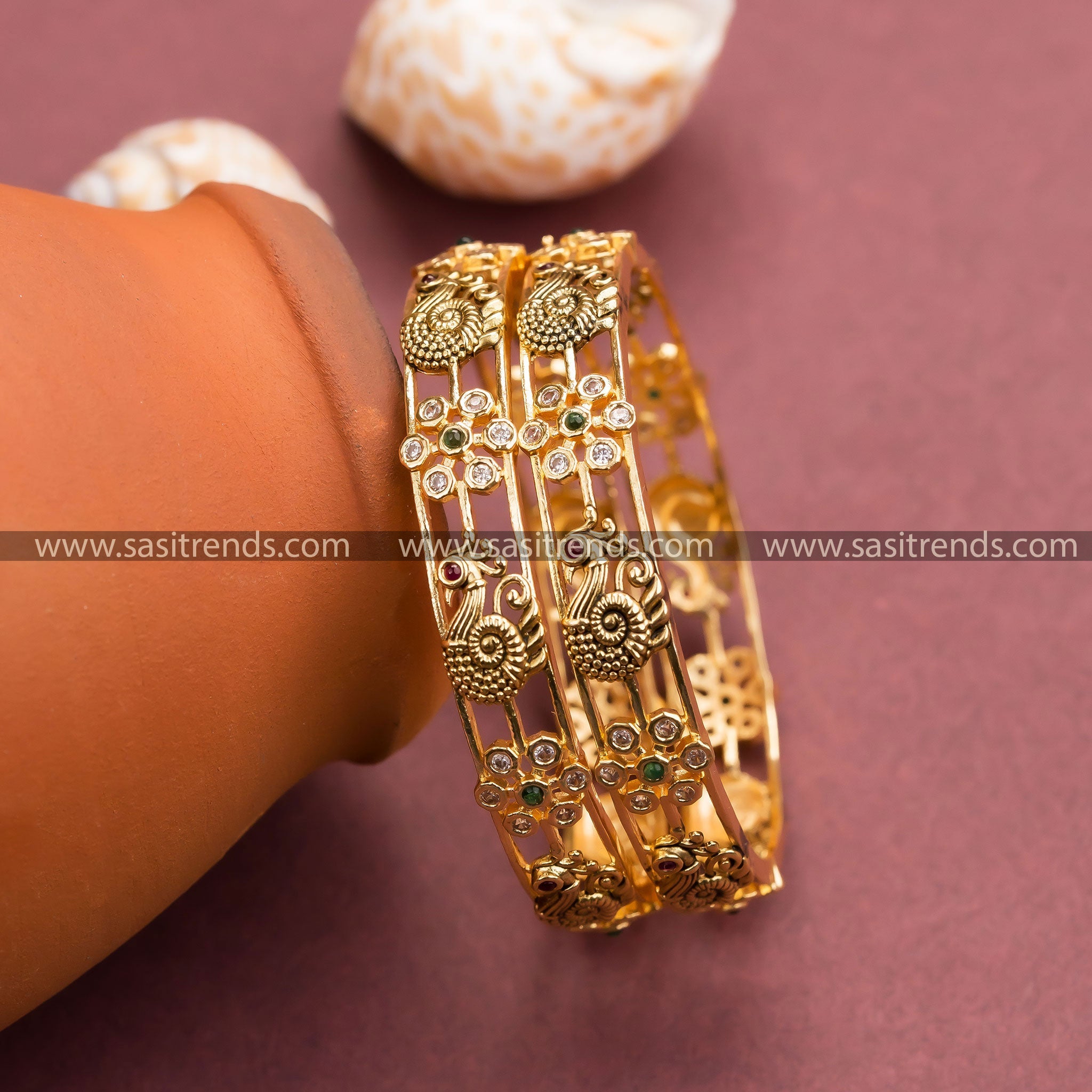 Temple Gold Finish Bangles with Peacock and Floral Motifs, Studded with Multi-Color Stones