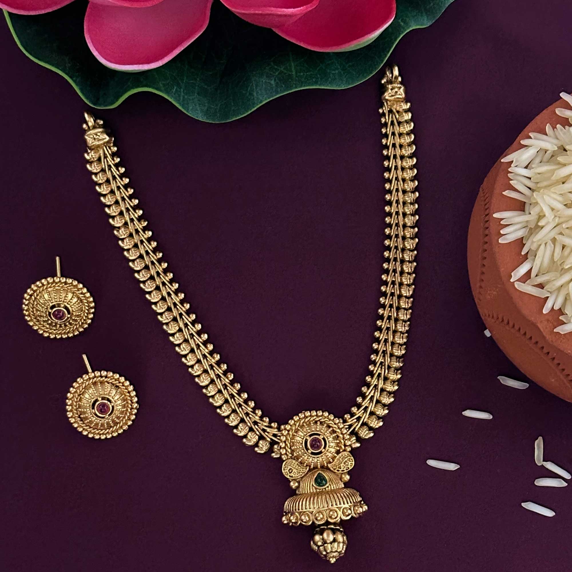 Traditional antique gold plated necklace set with premium stones and bell pendant