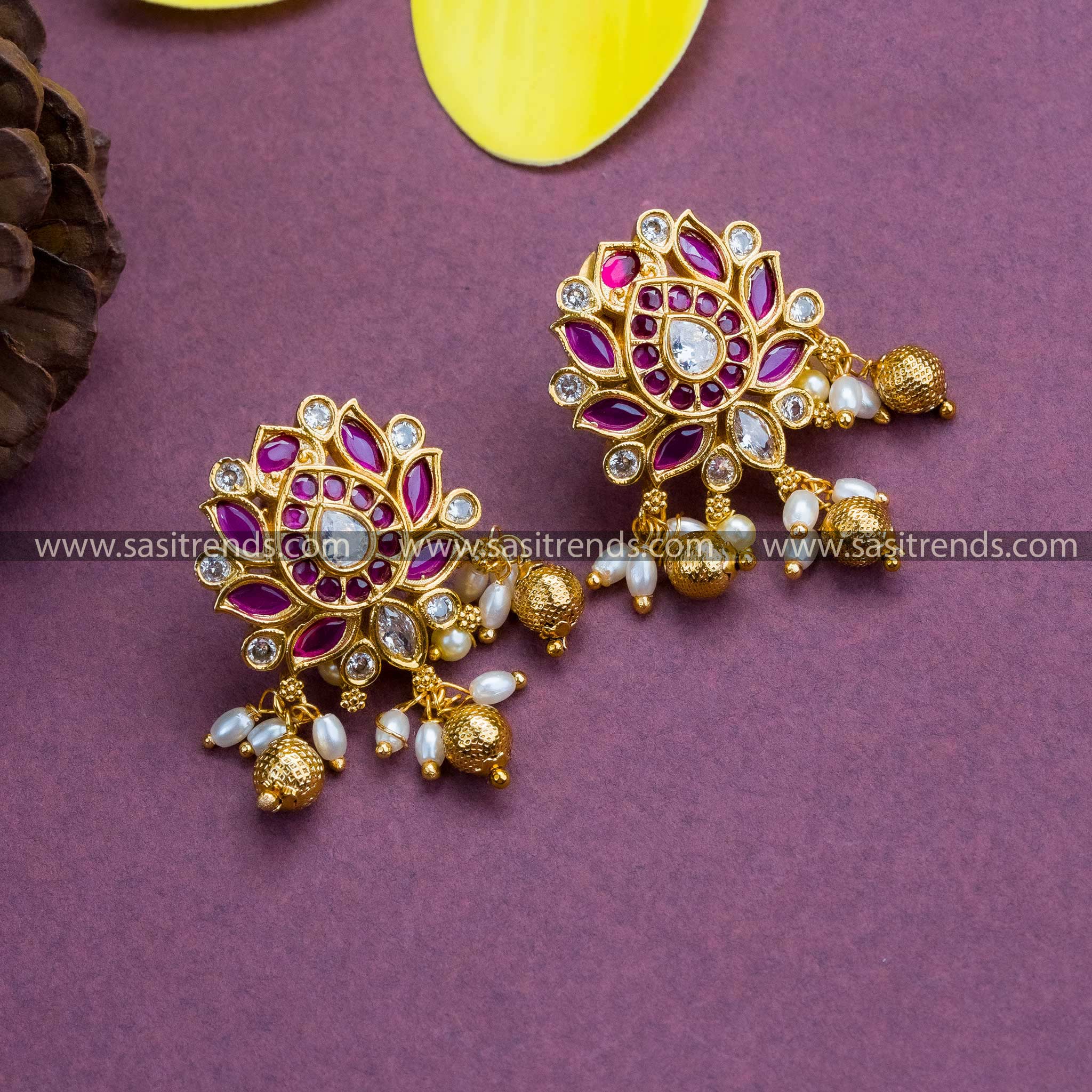 Traditional Earrings with Graceful Temple Gold Plated Lotus Floral Design, Kemp AD Stones in Ruby-White Hue, Pearls, and Bead Hangings