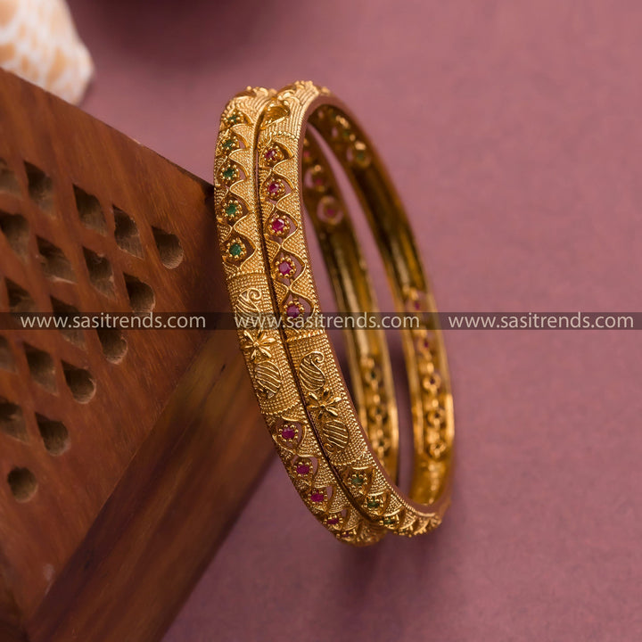 Gorgeous Temple Matte Gold Plated Bangles with Floral and Leaf Pattern, Studded with Ruby Green AD Stones | Sasitrends