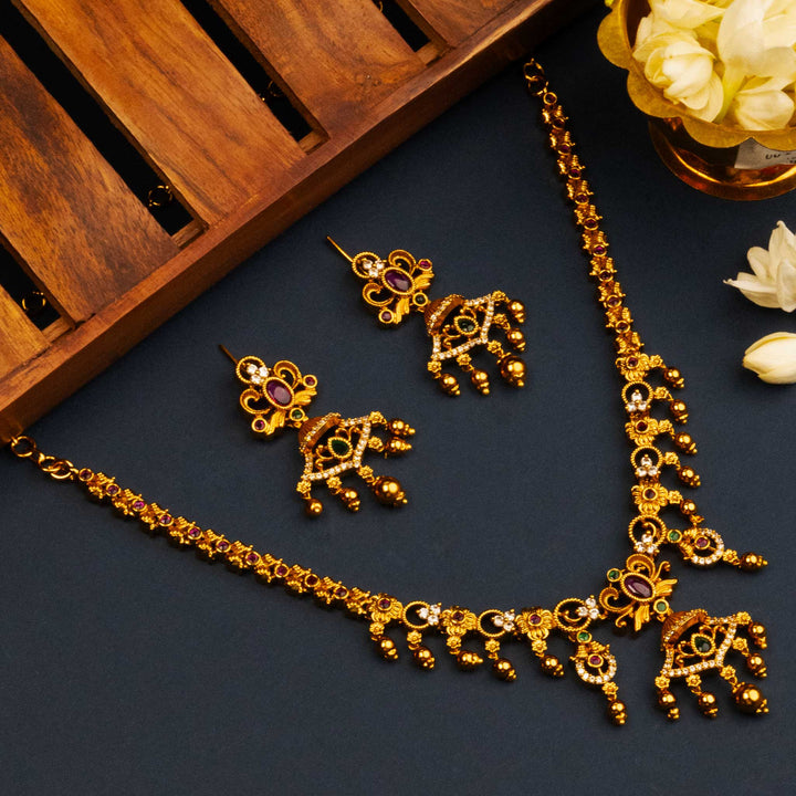 Temple Floral Jewellery Set with Matte Gold Plating and AD Stones | Sasitrends