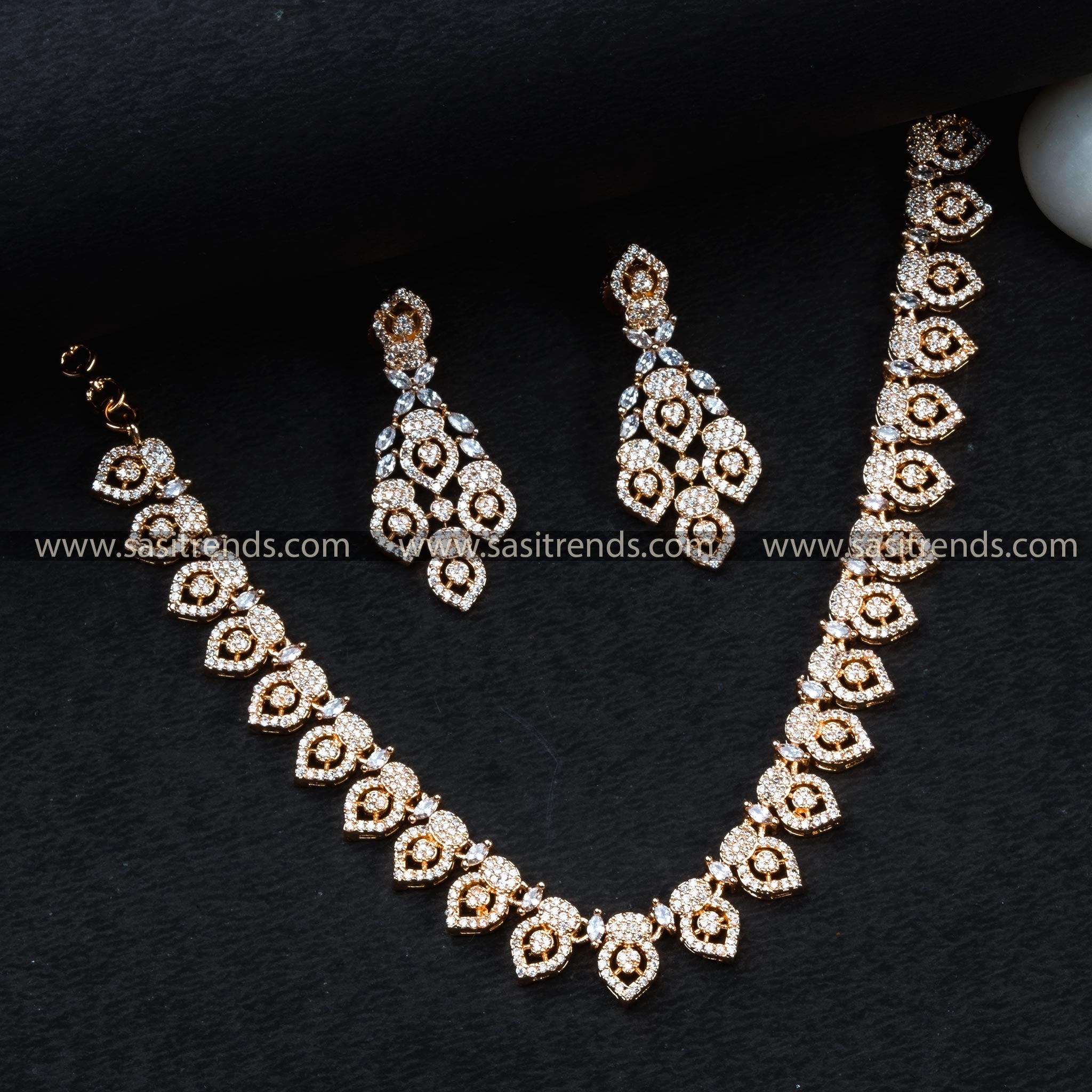 Elegant Rose Gold Floral Necklace Set with AD Stones.