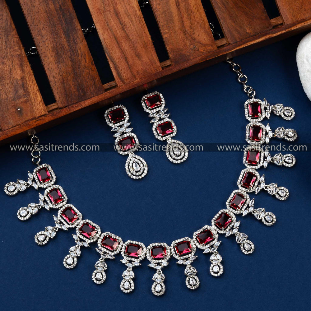 Rhodium Silver Plated Necklace Set with Red American Diamonds - Elevate Your Style with This Beautiful Red Stone Jewelry Set.