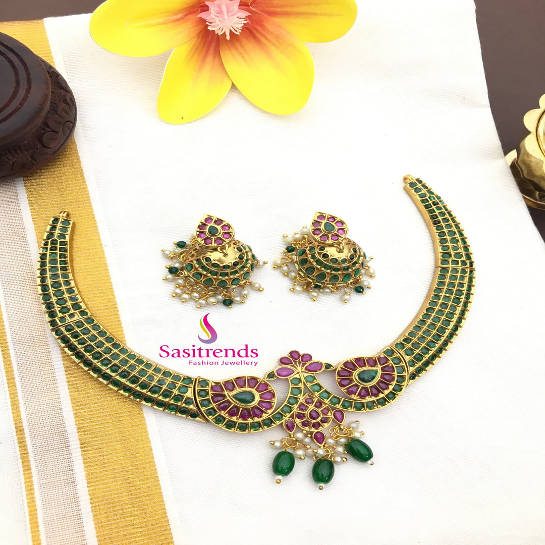 Exquisite Matte Gold Plated Floral American Diamond Necklace Set with Ruby-Green Stones. 